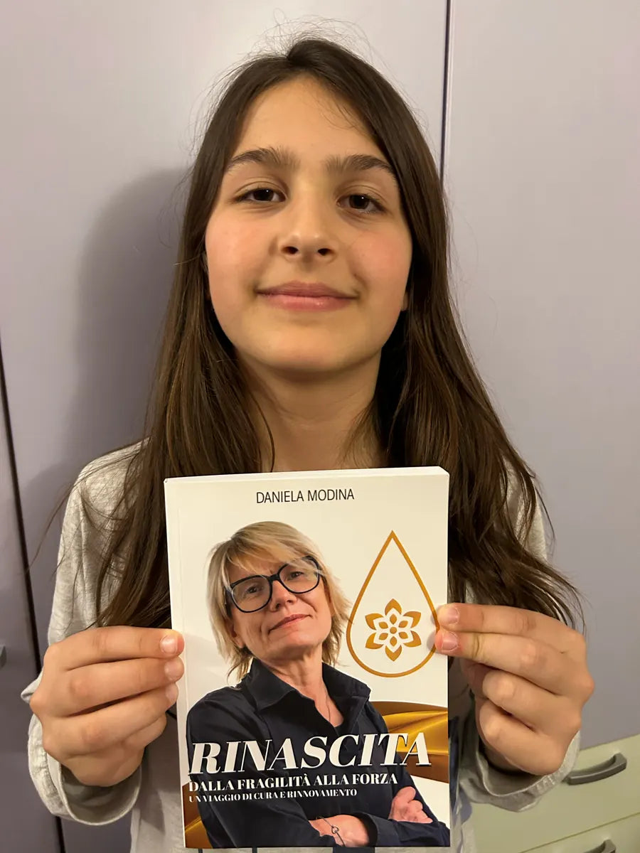 Cliente con il libro Rinascita di Daniela Modina